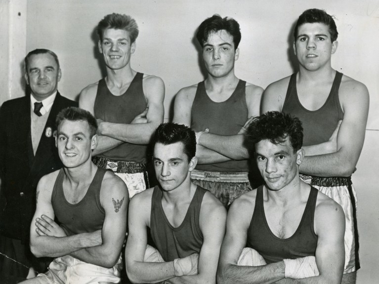 It’s 1958 and Dick is pictured as Dundee ABC claimed a record – at least in  post-war years – when they brought the club six out of the 10 titles at the Midlands Championships at Perth. Back row (from left) – trainer Frankie Quinn, lightweight Dick McTaggart, welter Johnstone Miller, light-middle John Brady. Front – featherweight Peter McTaggart, bantham John Leslie and light-welter Davie Scott.
