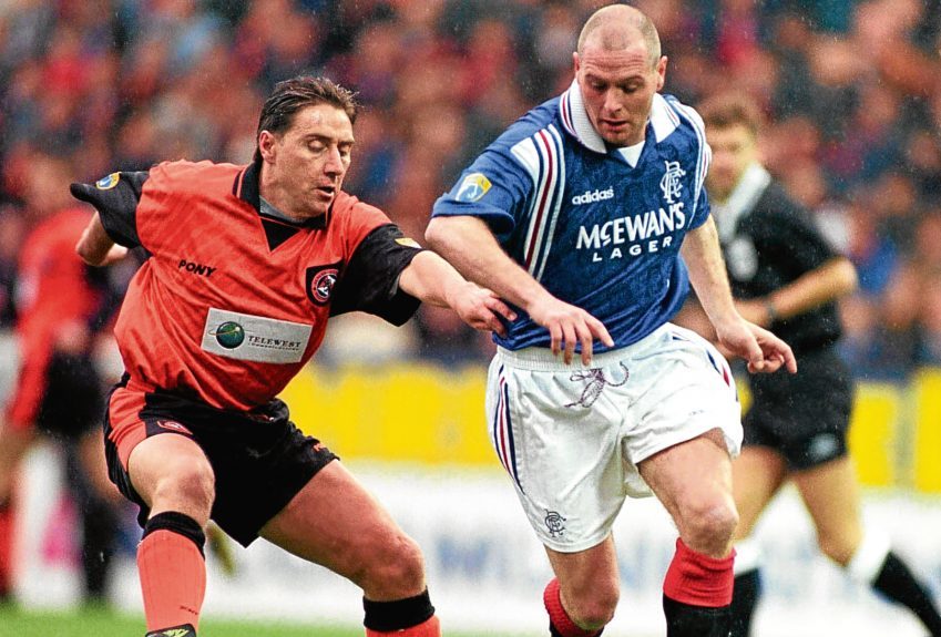 Jim McInally in action for Dundee United against Rangers’ Paul Gascoigne.