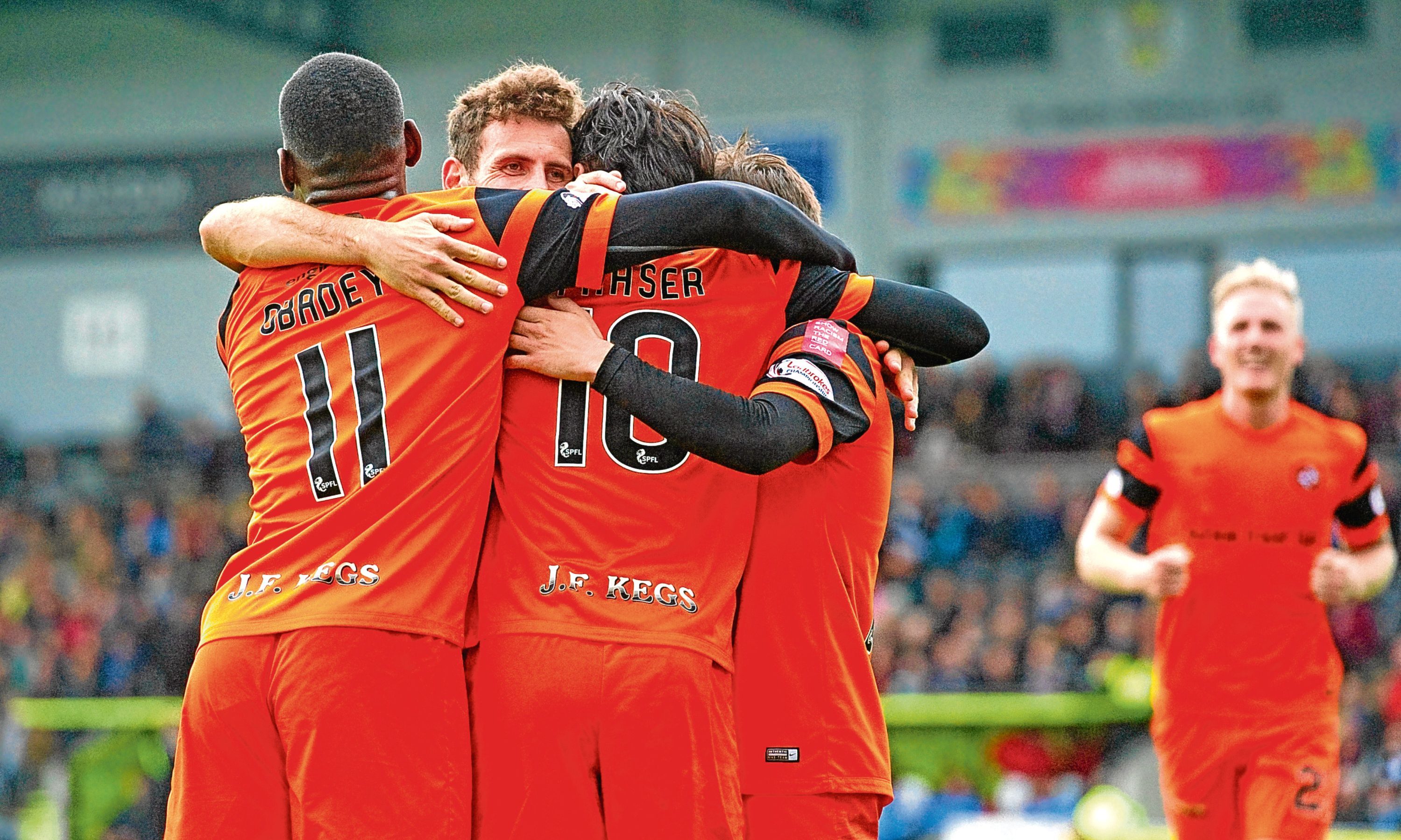 Dundee United's Scott Fraser (right) celebrates after scoring on Saturday.