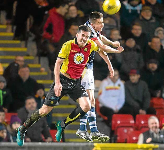 Cammy Kerr and Callum Booth battle in the air at Firhill on Wednesday. Picture by David Young
