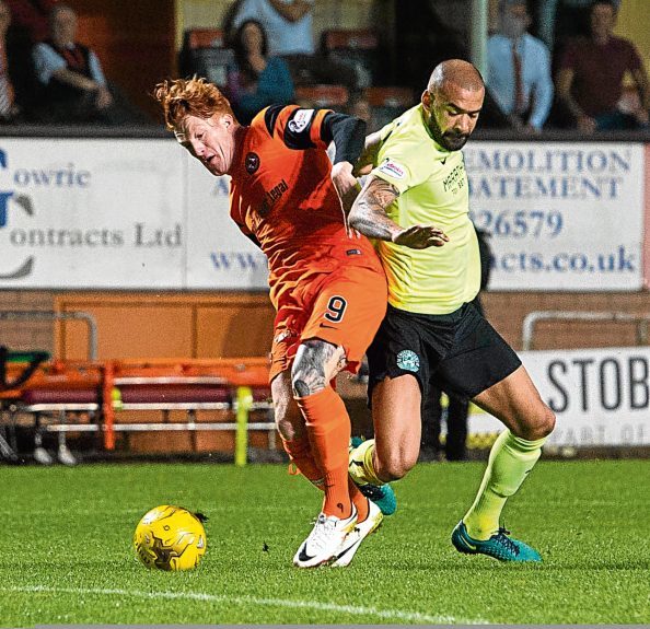 Striker Simon Murray earns the Tangerines a penalty last month.