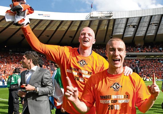 Garry Kenneth (left) and Sean Dillon celebrate Dundee Utd's win