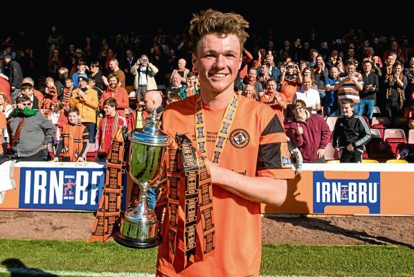 Dundee United's Jamie Robson with the Challenge Cup