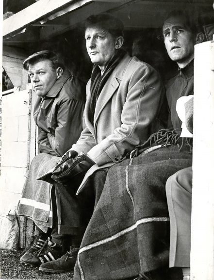 obby Ancell in a Muirton Park dugout with physio Bruce Hay (left) and striker Sammy Wilson.