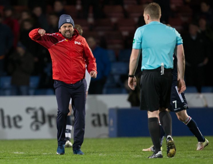 Dundee manager Paul Hartley confronts referee John Beaton at  full time. Picture by David Young