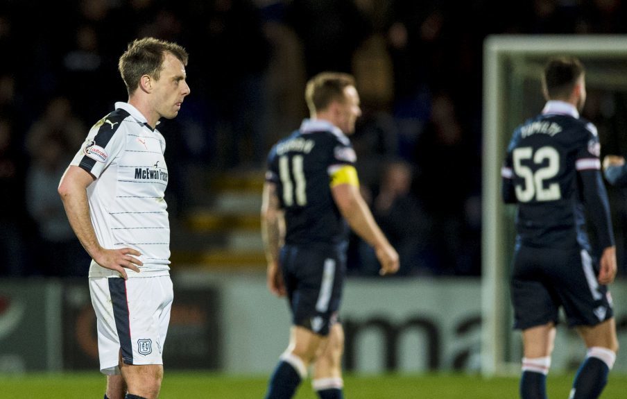 Paul McGowan stands dejected after the 2-1 defeat to Ross County