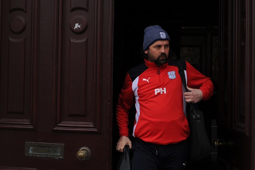 Paul Hartley leaves Dens Park for the last time after he was told his services were no longer required
