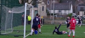 The ball is in the back of the Pupils’ net for Saints’ third goal, but who scored it – Craig MacEwan or Marc Maccallum? After lengthy deliberation the goal was eventually given to Maccallum.