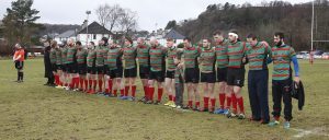 Oban Lorne RFC players observe the minute’s silence before Saturday’s game against Garnock. Photos: Stephen Lawson