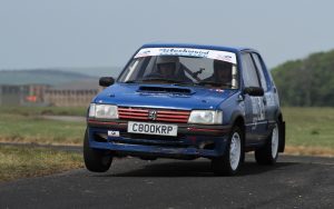 John Kean and Malcolm McDonald in their Peugeot 205.