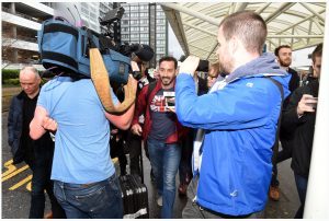 Billy Irving is surrounded by journalists. Picture: Daily Record