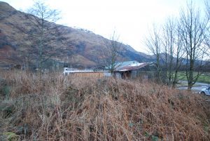 Part of the proposed site, close to the River Fyne, with existing buildings in the foreground that would be cleared for the caviar farm. 06_a02LochFyneCaviar02