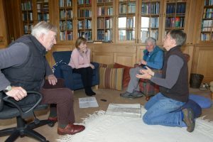 Don Dennis, far right, describes Achamore house to from left: Alasdair McNeill, Helen Haugh and Susan Allan in the library.:
