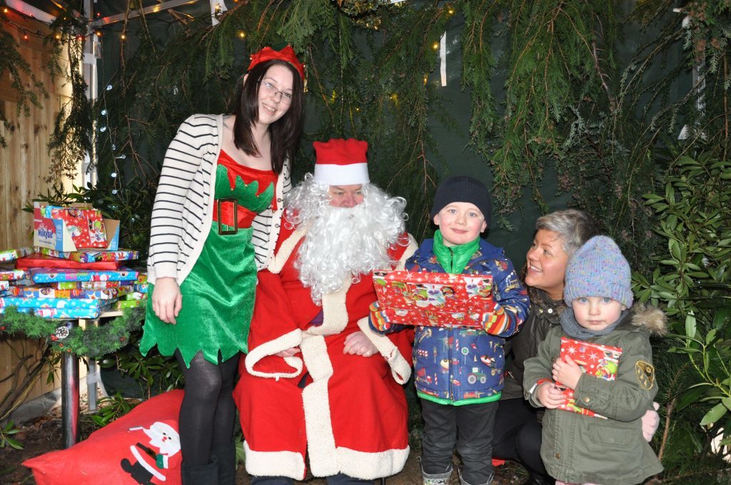 Euan and Katie Fleming were delighted to meet Santa with mum Lindsay Baughan