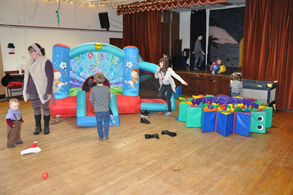 Corrie children enjoyed a bouncy castle and ball pit and a variety of activities including cake decorating and meeting Santa