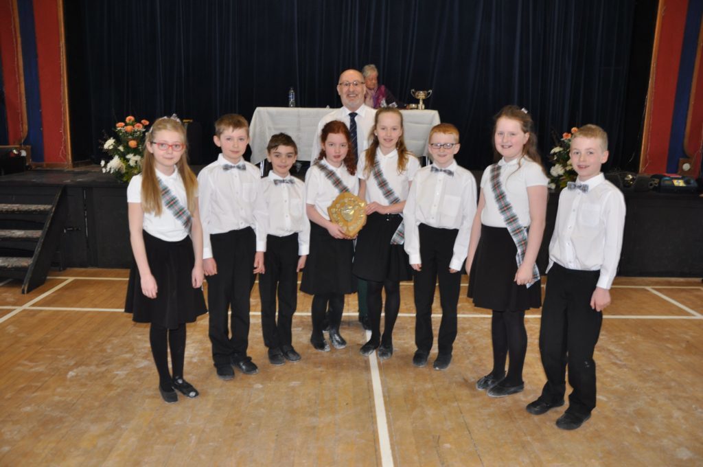 Shiskine P3 to P5 pupils receive the Associations Shield