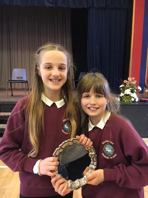Caitlin Fraser, right, accompanied by Greta Litton took the strings solo elementary  category, winning themselves the Festival Salver