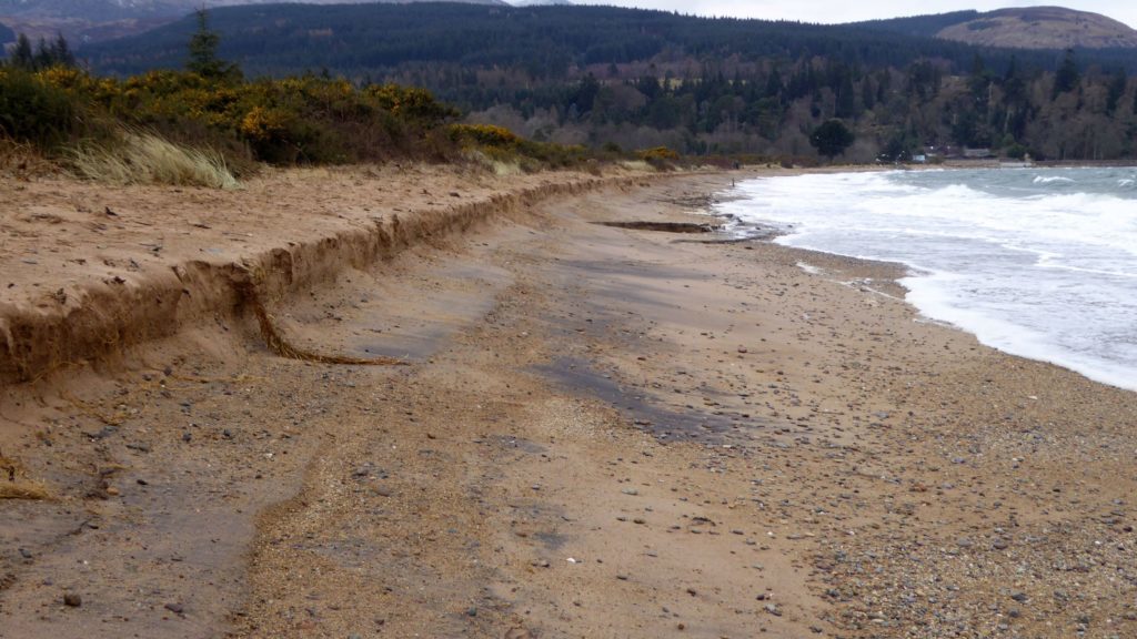 A sharp embankment shows the amount of sand that has been displaced on Brodick beach. Photo by John Baraclough