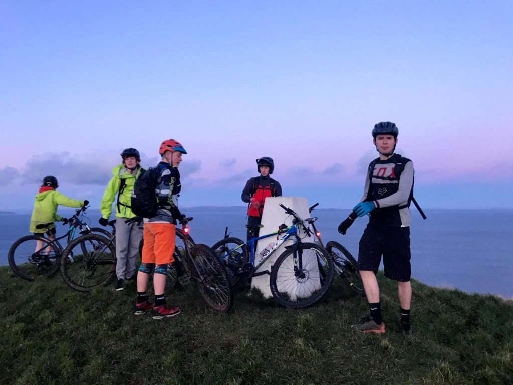 Arran High Schools Mountain Bike Club members pictured at the Clauchland trigpoint
