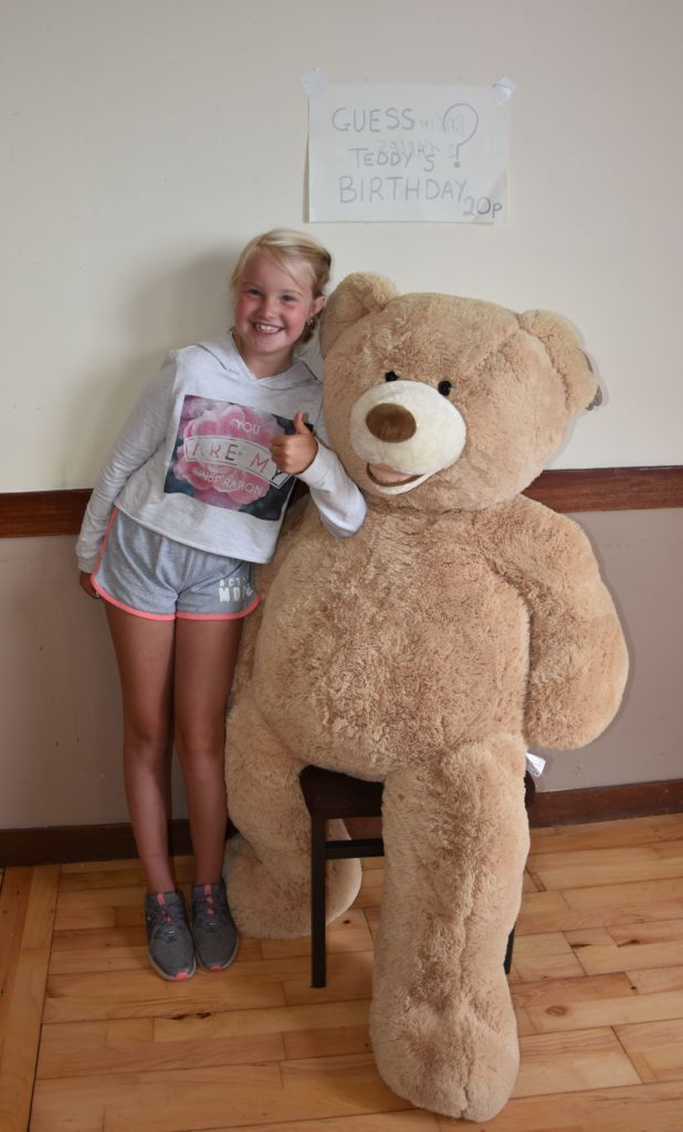 Melissa Littlejohn aged 9 was delighted to win the giant teddy bear whose birthday she correctly guessed as the 17th March, the same as her fathers.