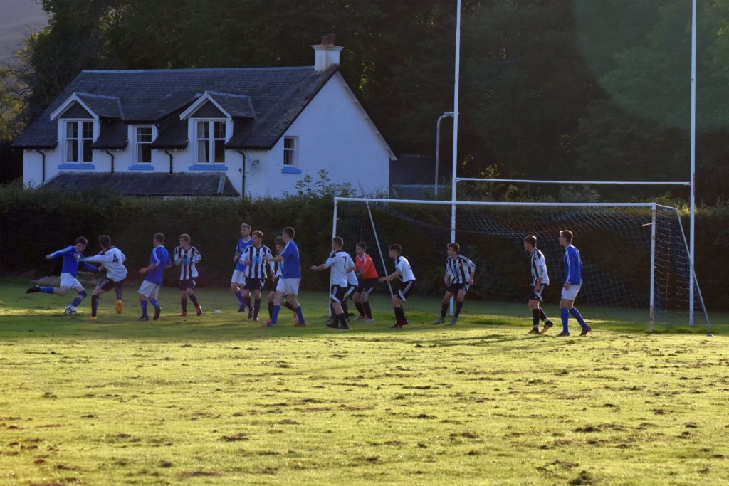 A crowded penalty box as Brodick desperately try to score among a sea of Lamlash players.