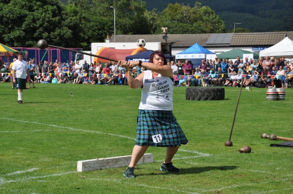 AUGUST - Yvonne Currie makes history as the first female competitor in the heavy events at the Brodick Highland Games.