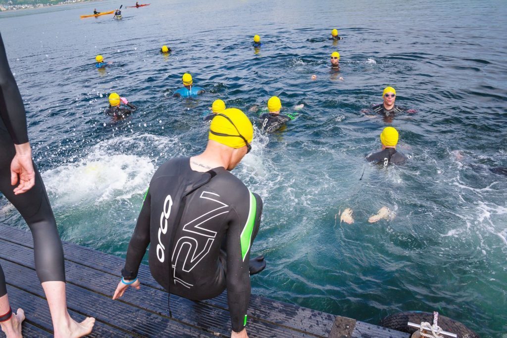 Contestants set off from Holy Isle to swim to Lamlash.