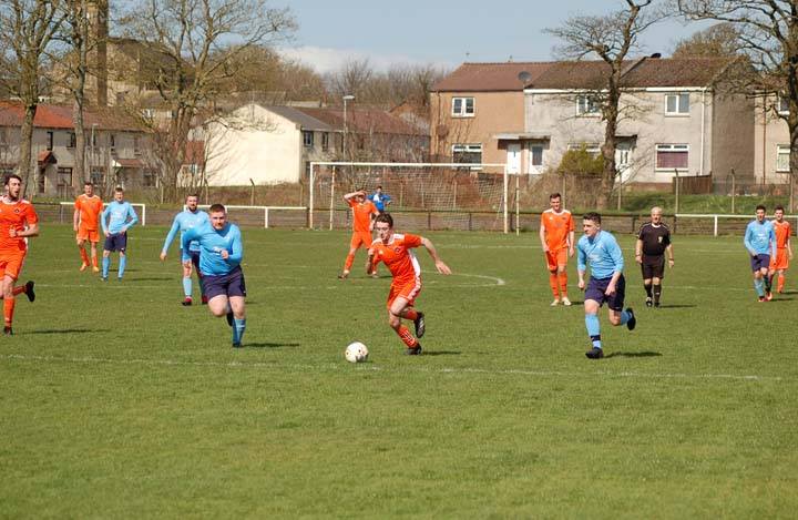 Johnny Sloss drives the ball from mid field all the way into the oppositions defence.