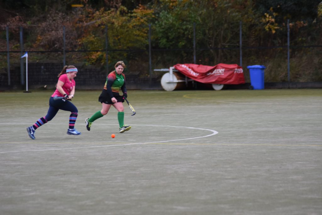Jenny Stark runs at full speed to secure the ball and pass it to her forward players.