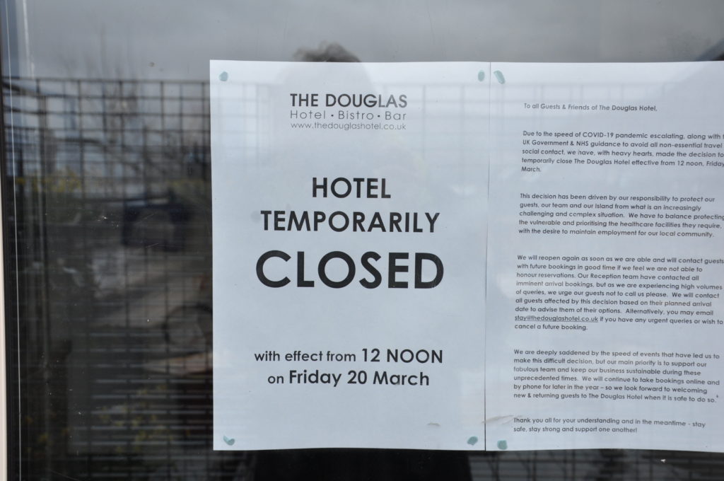 The hotel closure sign.