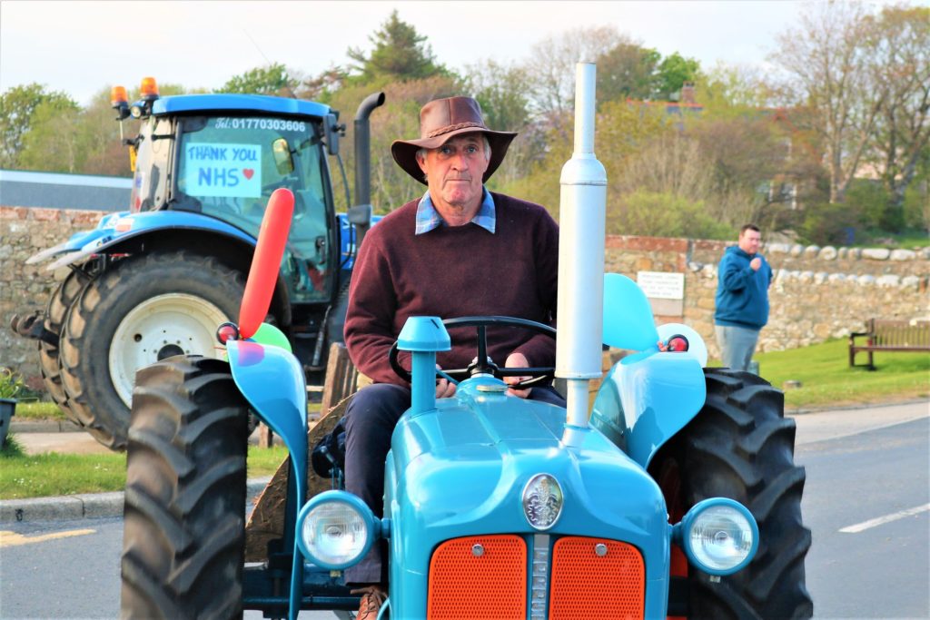 Donald Murchie shows his support for the NHS at the tractor parade.