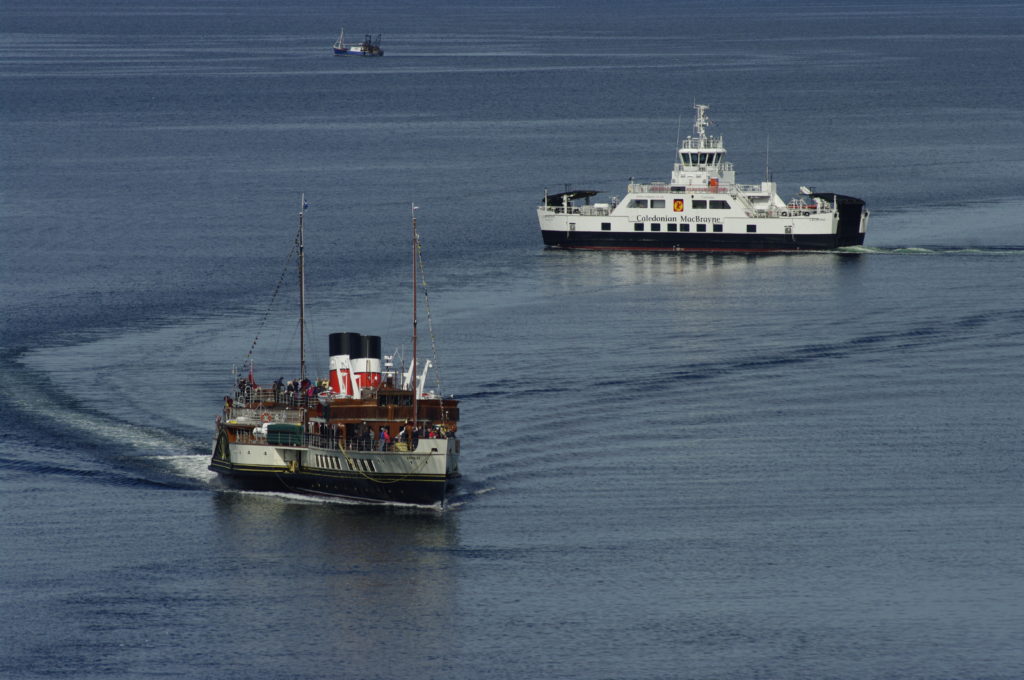 The Waverley sweeps past the Catriona ferry bound to Claonaig.