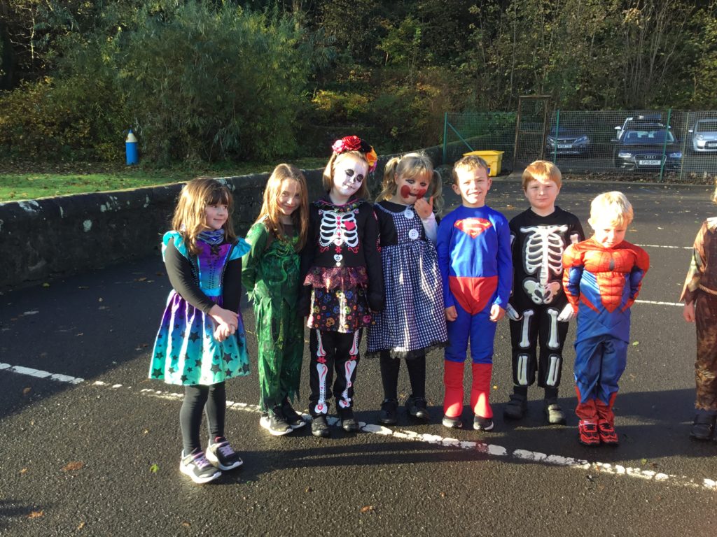 Whiting Bay primary pupils enjoy some afternoon sunshine at their dress up day.