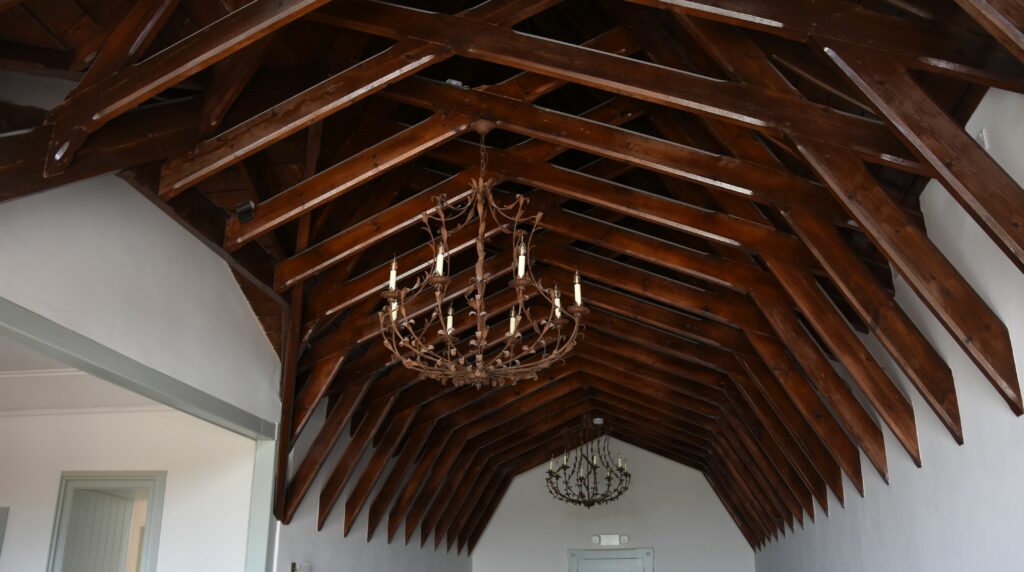 The magnificent restored wooden roof of The Boathouse and splendid chandeliers.