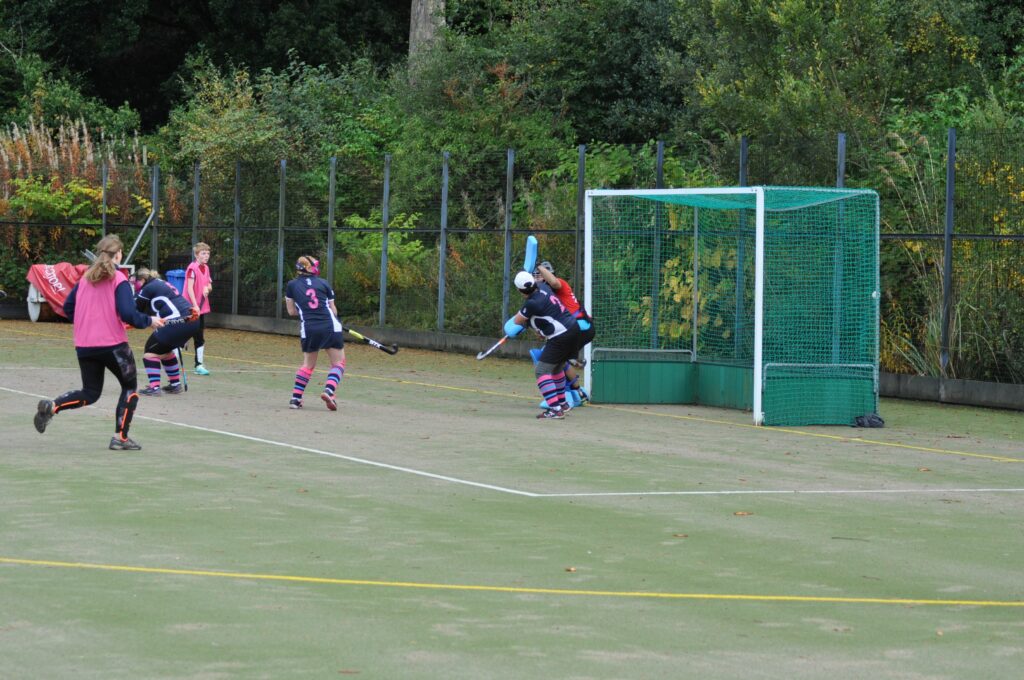 The ball can be seen in the back of the net after an attempt at goal by the Senior Ladies.