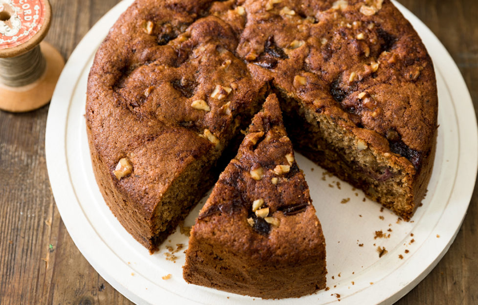 Rich, moist, spongy date and walnut cake, 2 slices cut