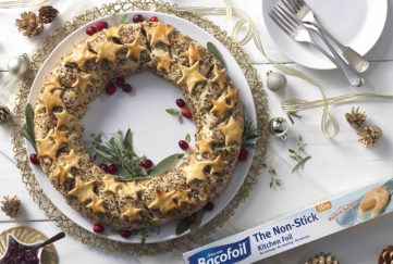 Vegetarian wreath, pastry ring sprinkled with seeds and decorated with pastry stars