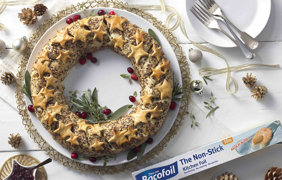 Vegetarian wreath, pastry ring sprinkled with seeds and decorated with pastry stars