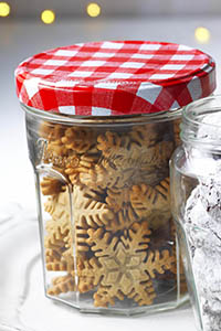 Jar of spiced sugar snowflakes - look like ginger biscuits. Bonne Maman mini festive treats