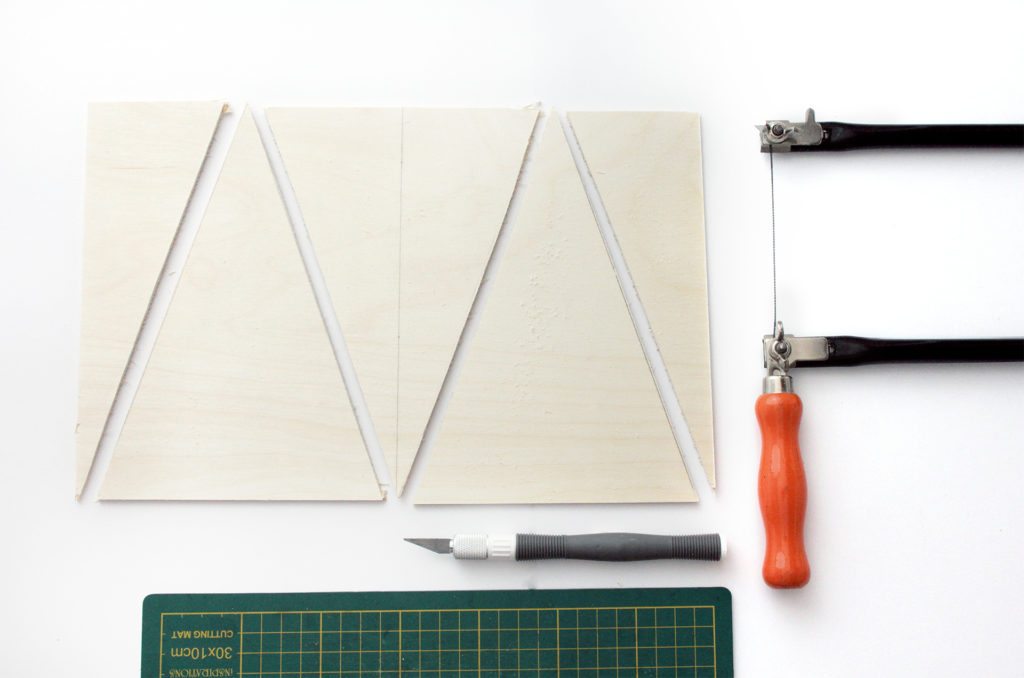2 isosceles triangles cut from plywood