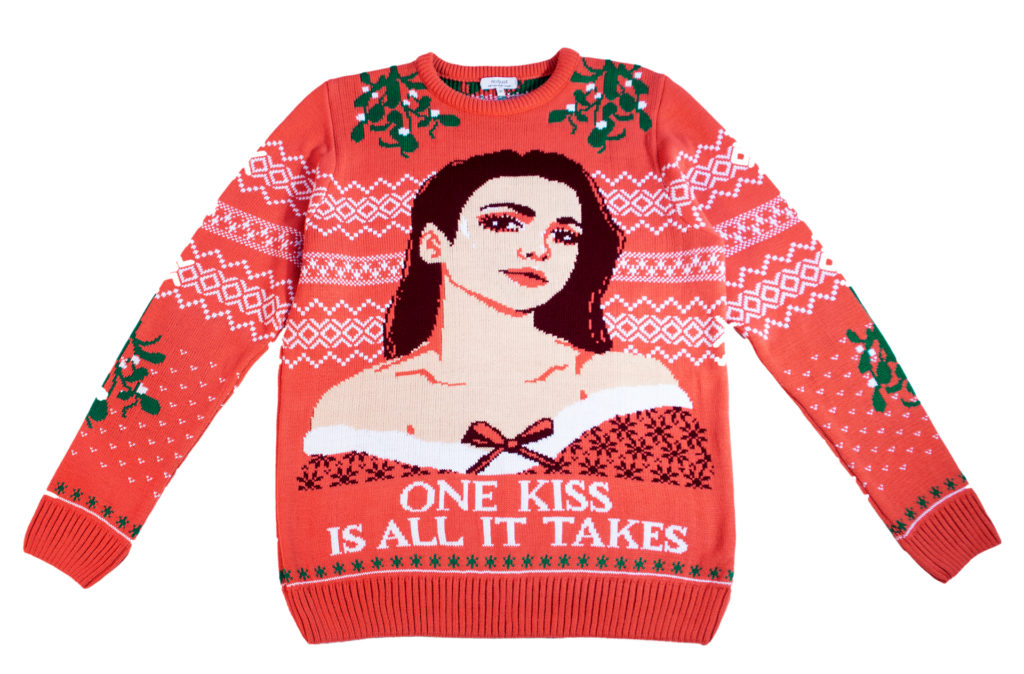 Red and white machine knitted Christmas jumper with image of Dua Lipa, attractive dark haired girl under mistletoe