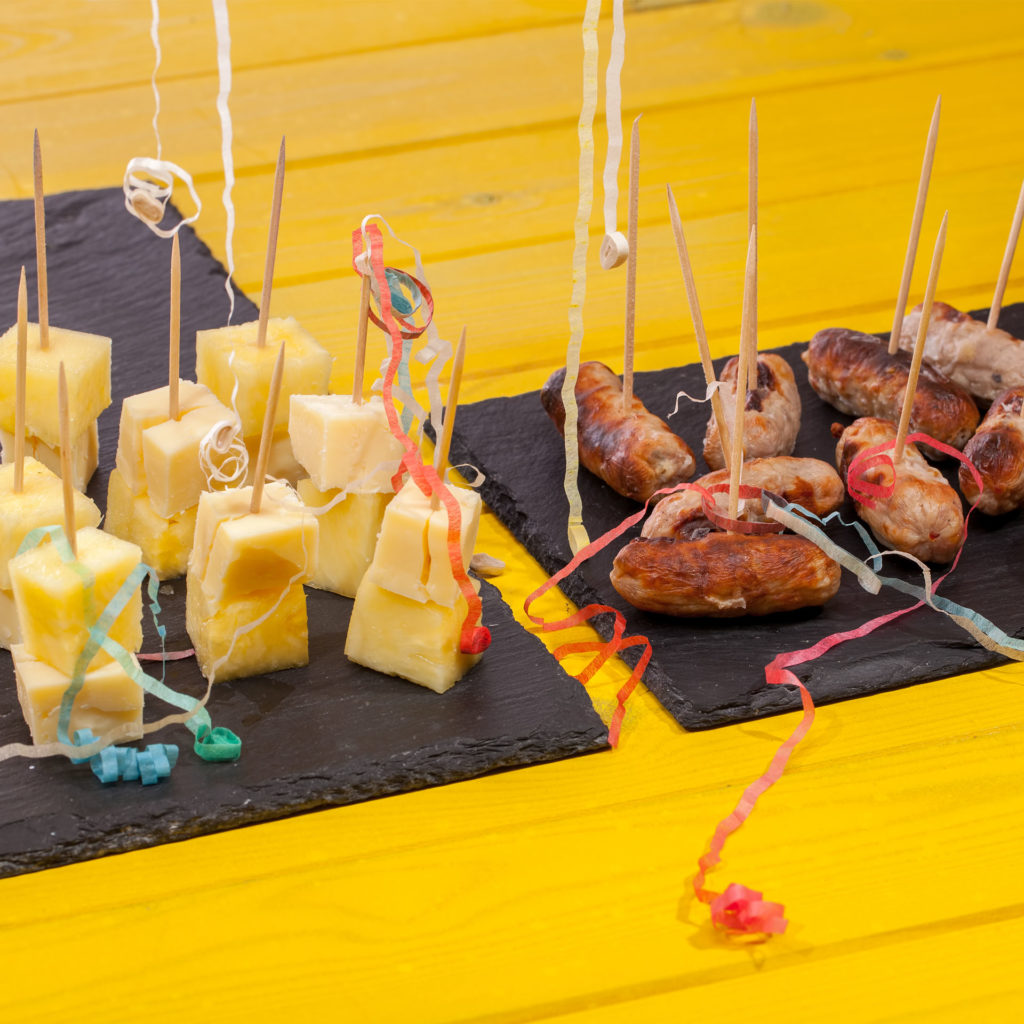 Buffet snacks on cocktail sticks, Cheese and pineapple and sausages