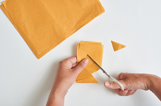 Cut tissue to make paper crowns