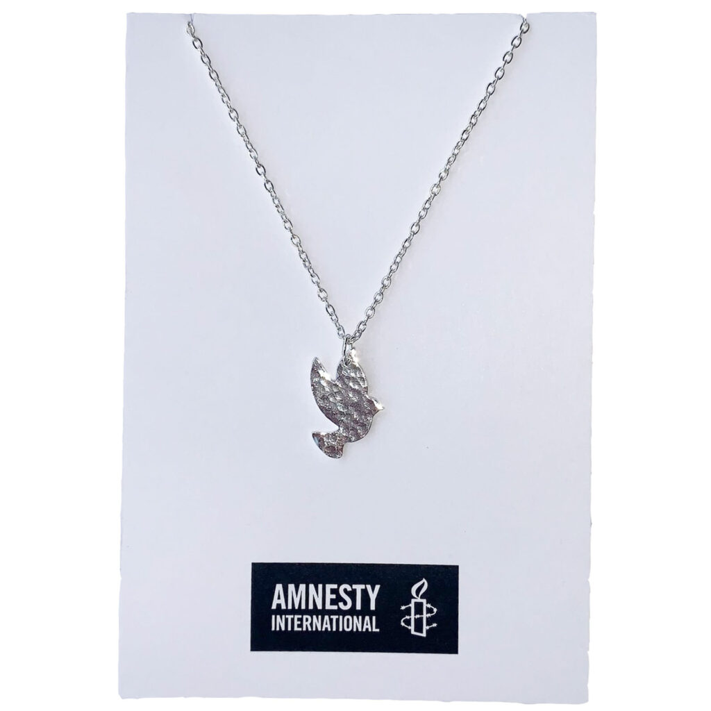 silver xoloured dove pendant and Amnesty International logo below