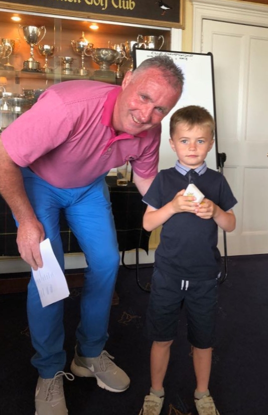 One of the youngest competitors, Craig MacMillan, with captain Calum MacMillan, won the four-hole competition.