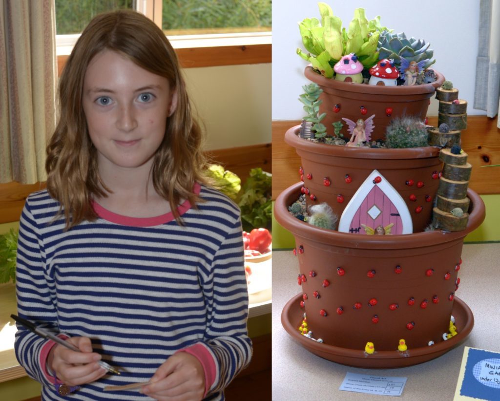 Zoe Quinn and her flower pot miniature garden.