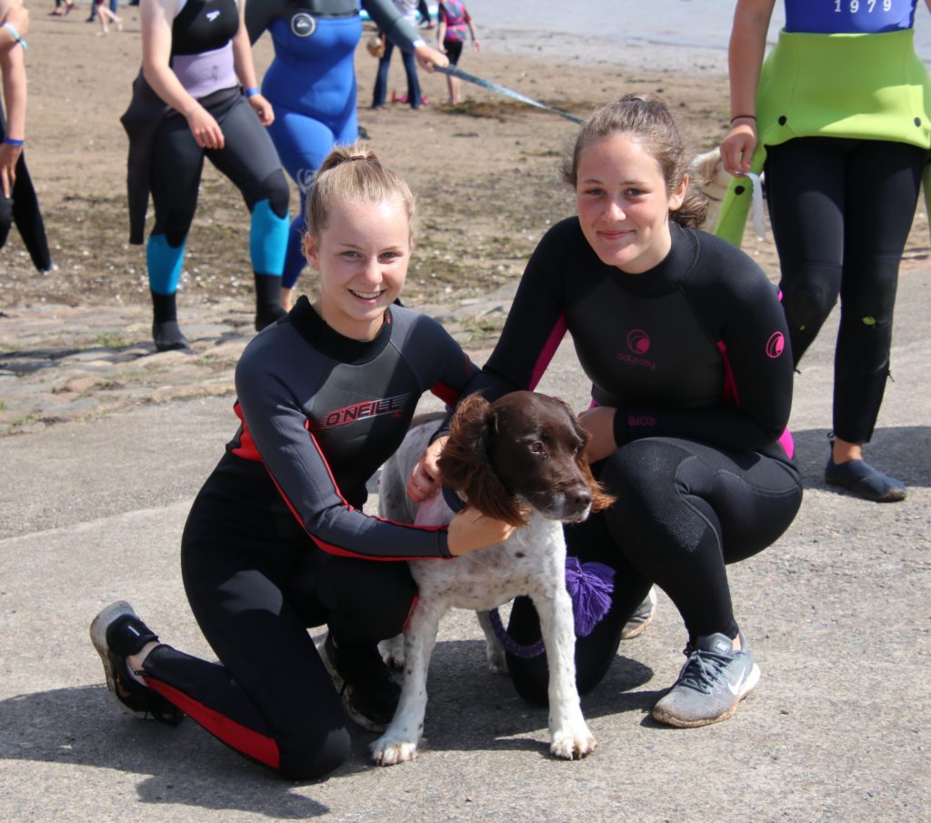 Alison Wylie, Jessica Ronald and their four-legged friend enjoyed their day at the beach.