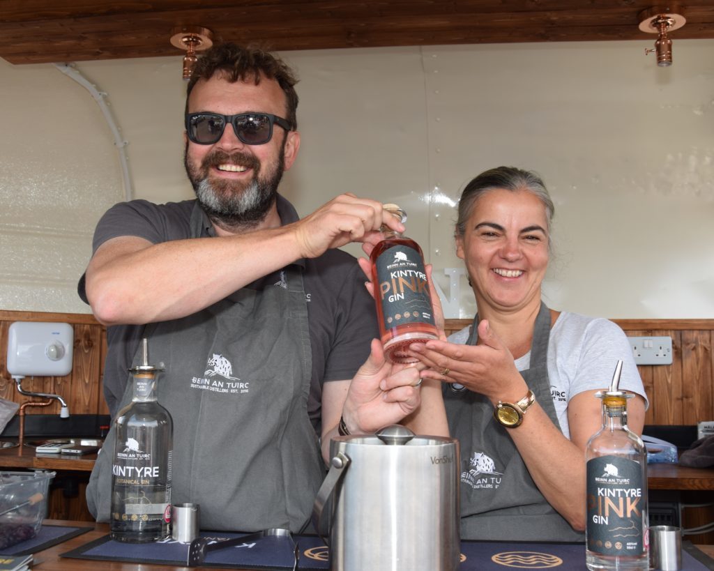Crowds net first pink gin at Carradale Harbour Day