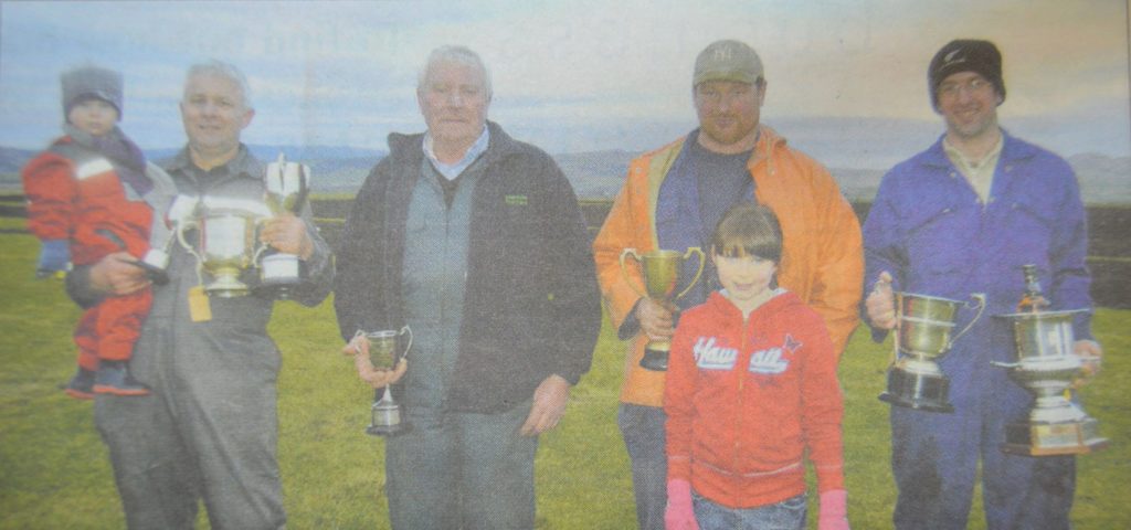 In 2011: The ploughing match’s main winners: Gavin Reid with grandson Ben, Willie Reid, Ian McKendrick with daughter Grace, and Thomas Ralston.