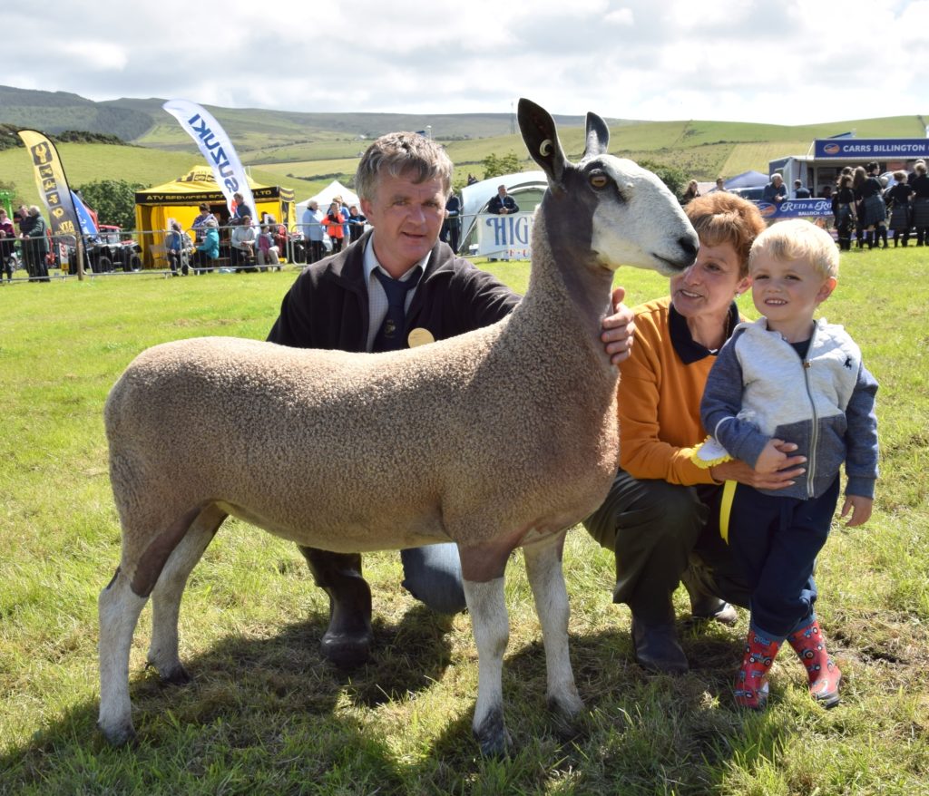 John and Jean McLachlan, with grandson Joshua, three, and the 2017 Kintyre Agricultural Society champion of champions. 50_c32kintyreshow45_mclachlan sheep